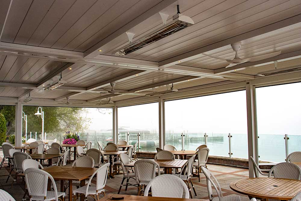 Enhance the versatility of your pergola with Magnatrack screens, our recommended solution for keeping outdoor spaces bug-free and comfortable. Azenco Outdoor for restaurant patio, pergola with screens