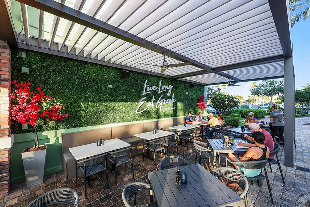 Soft background music can complement the ambiance and encourage longer stays without the hassle of external speaker setups. Azenco Outdoor Pergolas