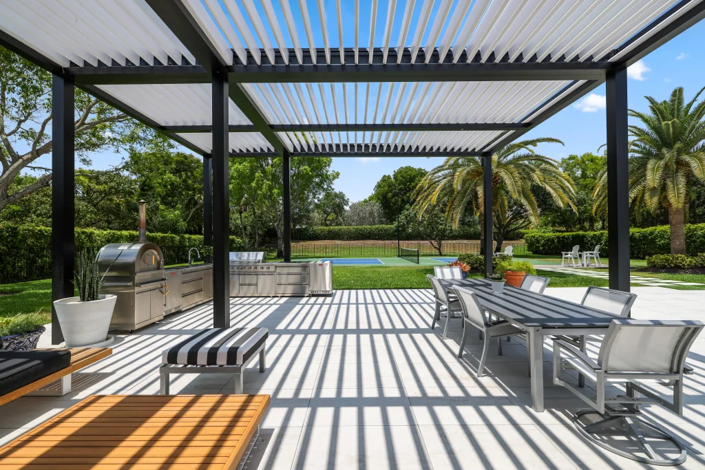 grey bronze r-blade featuring an outdoor kitchen