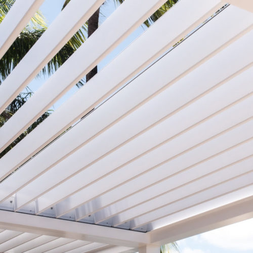 louvered roof over a hot tub