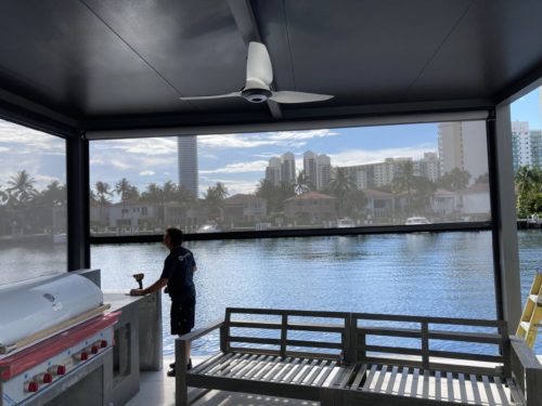 waterfront pergola with automated screens