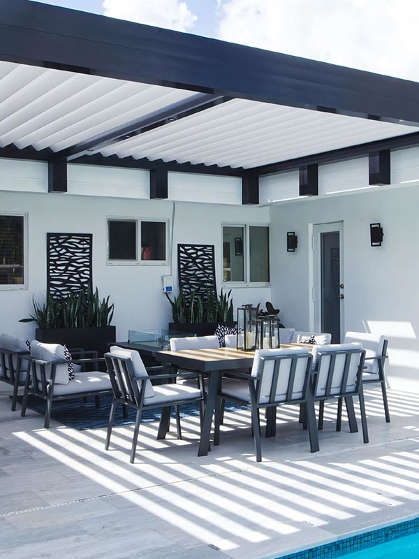 black and white aluminum custom pergola with wall risers - Azenco