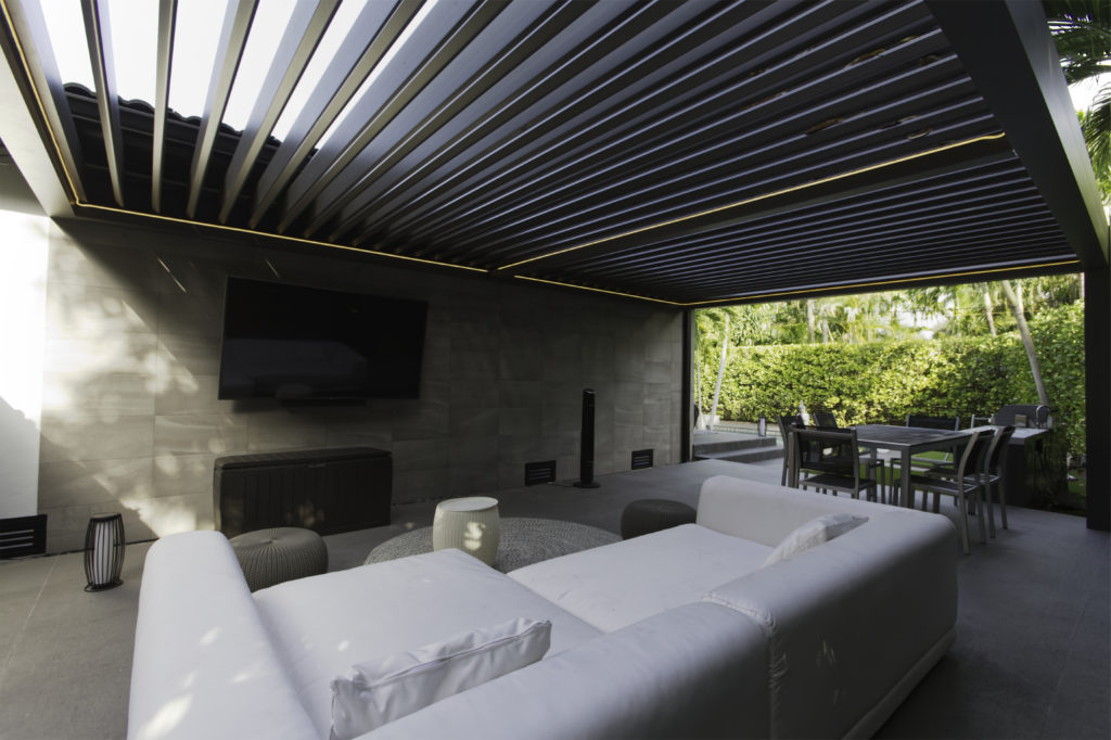 Louvered pergola cover perfect for winter