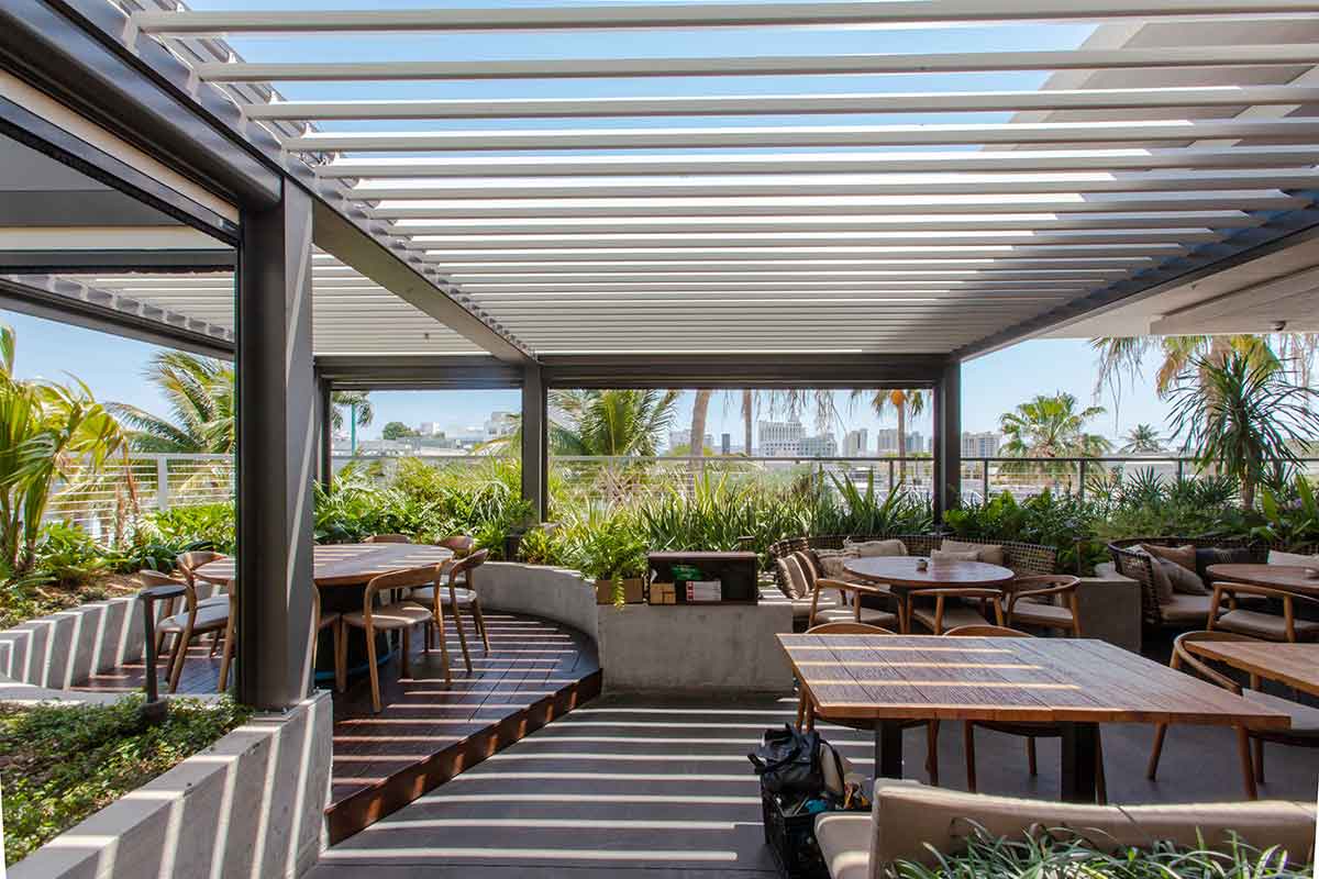 Rooftop terrace pergola. Model R-BLADE with motorized louvered roof by Azenco Outdoor