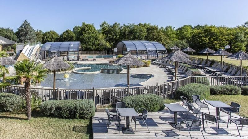 recreation park with open and close gigantic pool cover