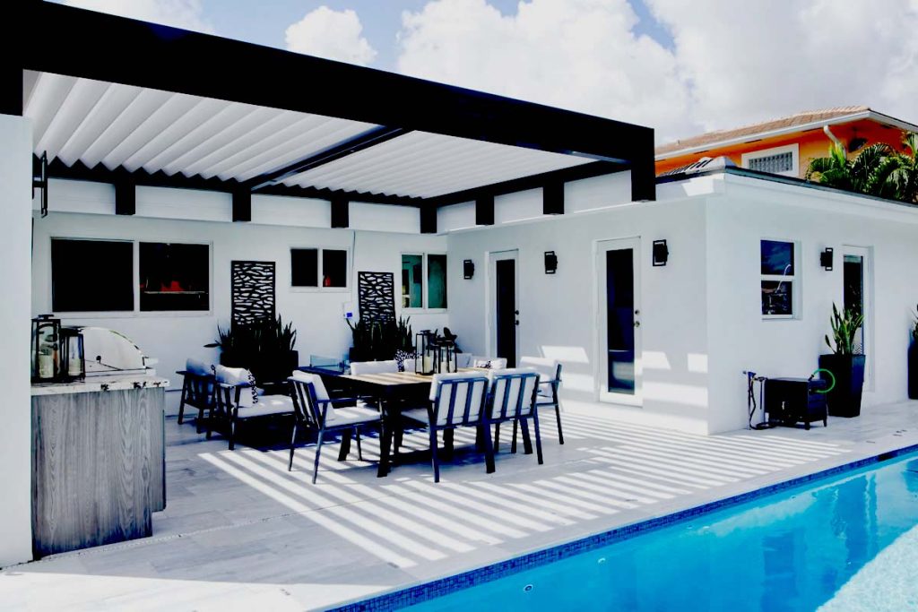 Tuxedo style perghola: black frame and whote louvers by Azenco. pompano Beach, FL