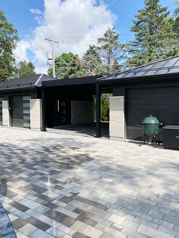 Covered outdoor area wiht black pergola by Azenco in Chicago, IL