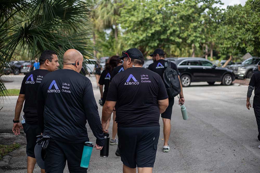 Azenco Outdoor: Life Is Better Outside. Team at a beach cleanup in Boca Raton, FL