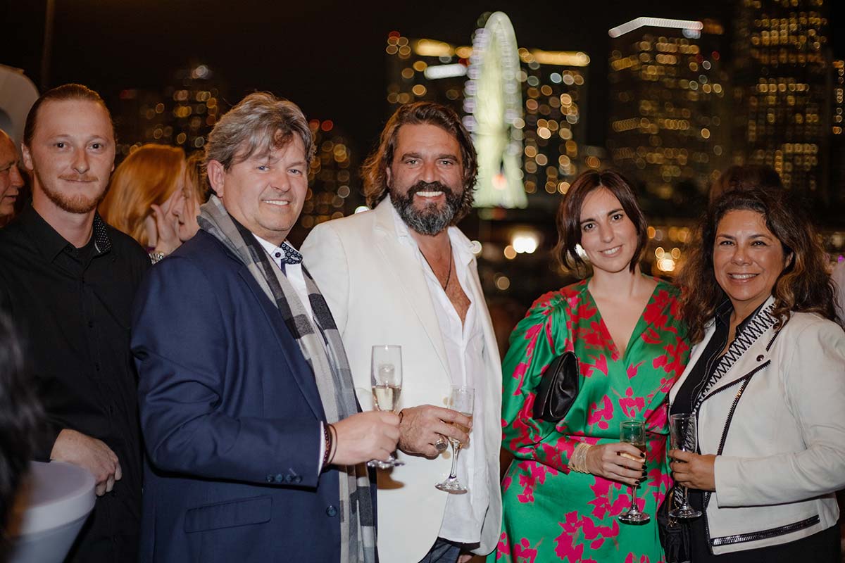 Leslie and Charles Chapus with pergoal dealers at the Azenco 2024 event in Miami, FL