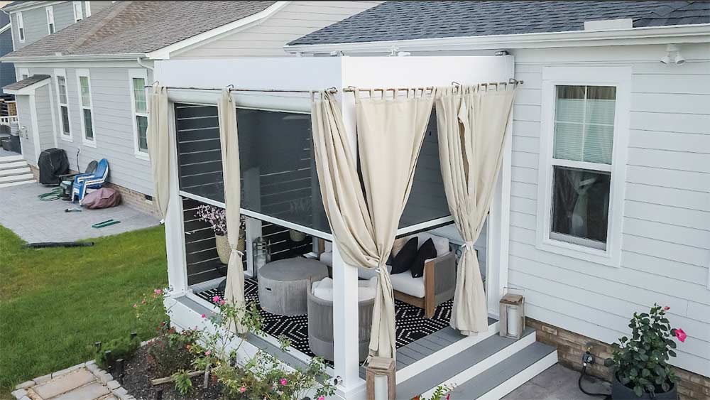 White pergola color choice with complementary gray louvers for added style