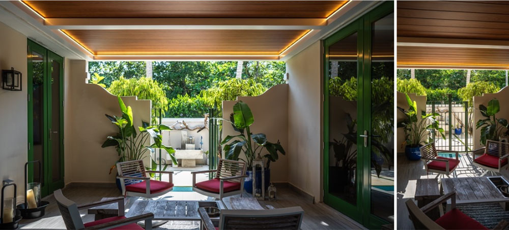Beautiful patio covered with Azenco louvered pergola with wood grain finish roof - The roof is shown closed on the picture