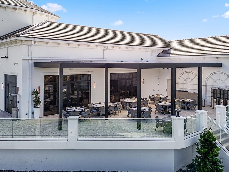 Commercial pergol installation on a raised deck - Broken Sound club in Boca Raton, FL - Model R-Blade pergol by Azenco Outdoor