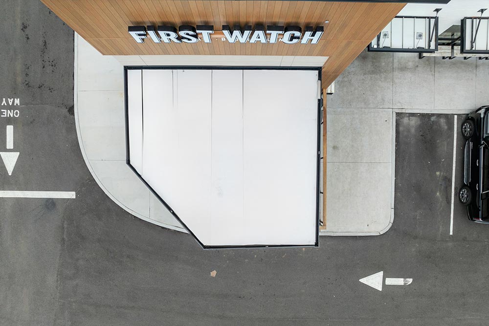 first watch restaurant pergola - drone view