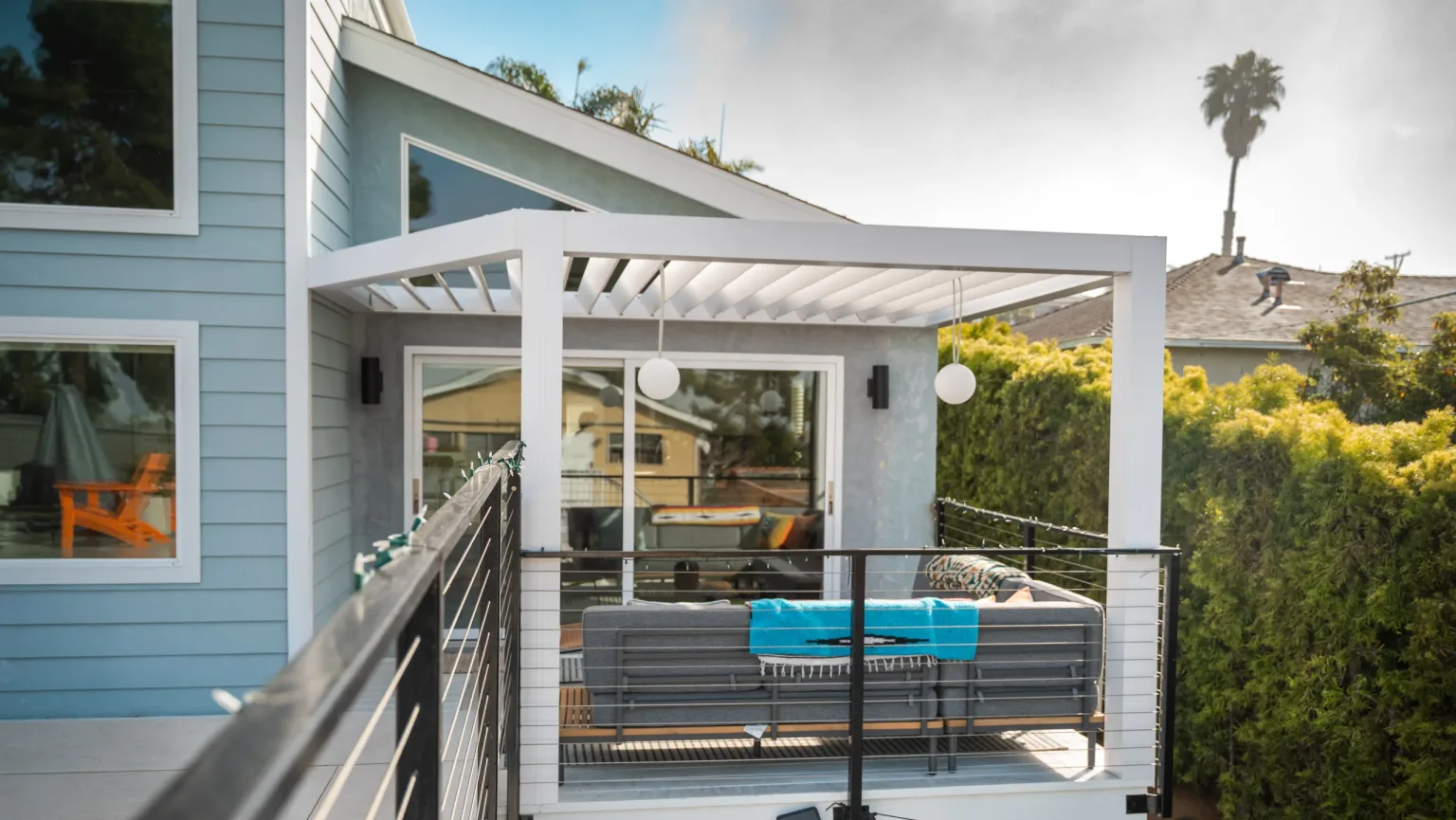 white r-breeze attached to a house with a custom cut