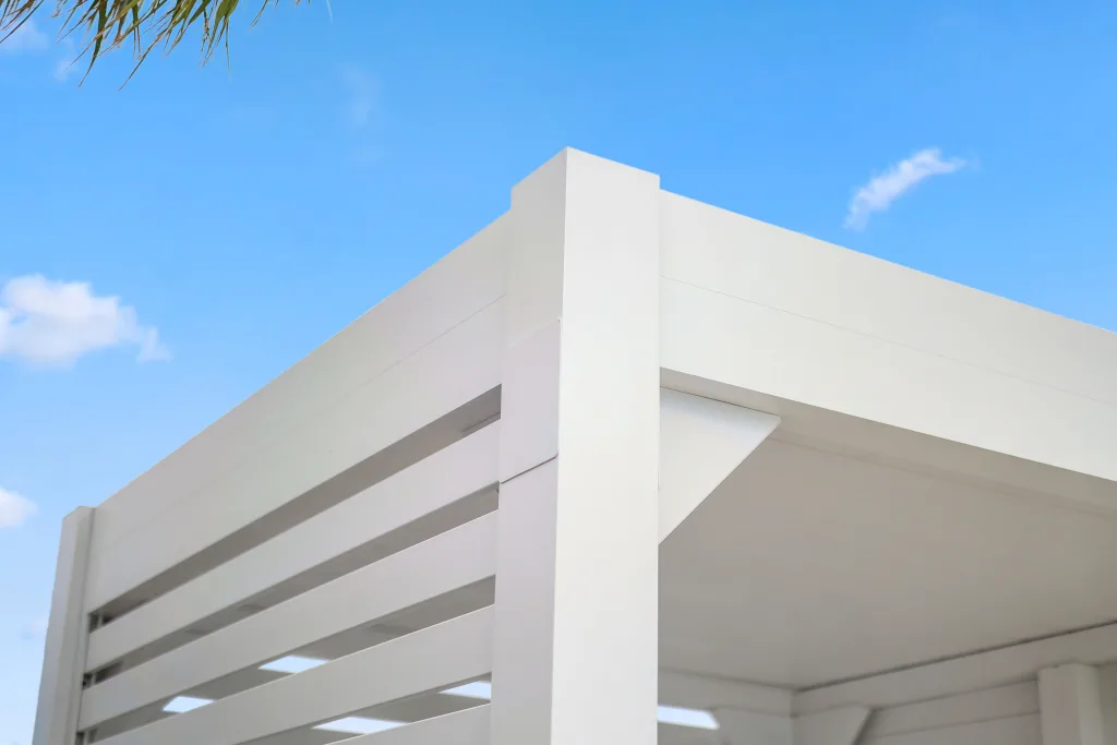 custom white r-blade poolside with privacy walls