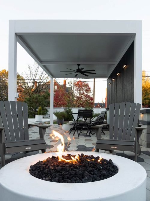 White pergola with fireplace: R-SHADE pergola with premium insulated roof, Azenco Outdoor