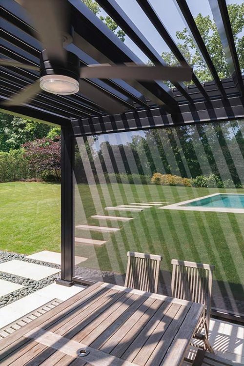 Outdoor dining space with bug screen to bit the setting suen